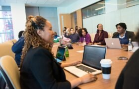 peope sitting around table